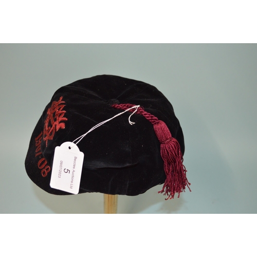 5 - An Edwardian dated 1907-08 school or university cricket or rugby sports cap, black velvet constructi... 