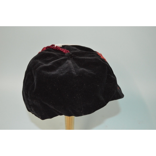 5 - An Edwardian dated 1907-08 school or university cricket or rugby sports cap, black velvet constructi... 