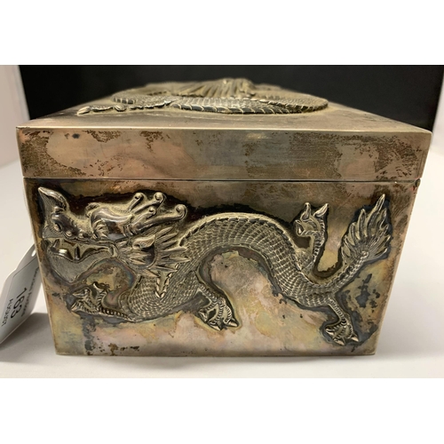 163 - A fine Oriental white metal and wood lined cigar box, elaborately decorated with dragons on all side... 