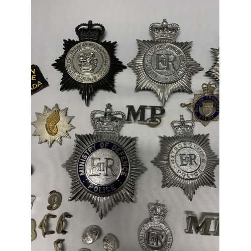 62 - A mixed lot of Police helmet plates plus badges