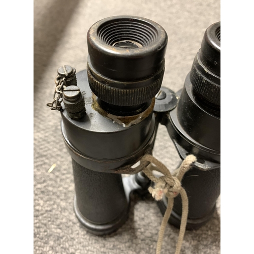 299 - Cased Barr & Stroud military marked binoculars (glue repair to left eye piece)