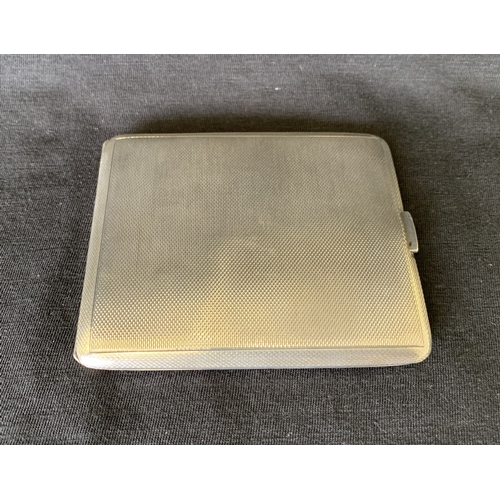 125 - A hallmarked silver cigarette case, Birmingham 1940, maker E J Trevitt & Son, weight approx. 110g