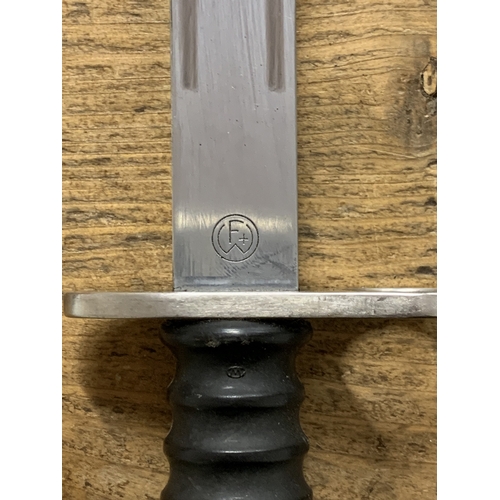 143 - A Swiss SIG M1957 bayonet with scabbard