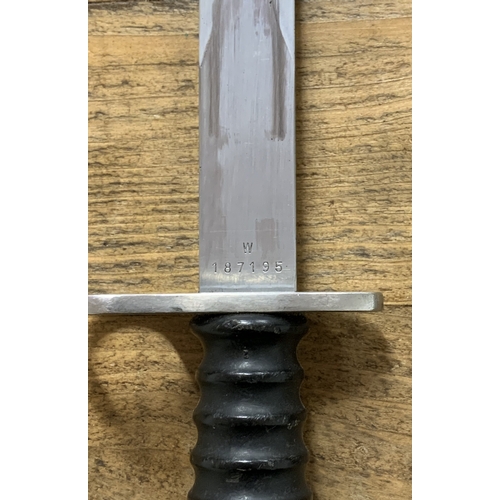 143 - A Swiss SIG M1957 bayonet with scabbard