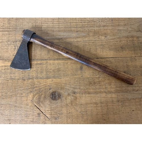 147 - An antique tomahawk, forged blade, maker marked, 18