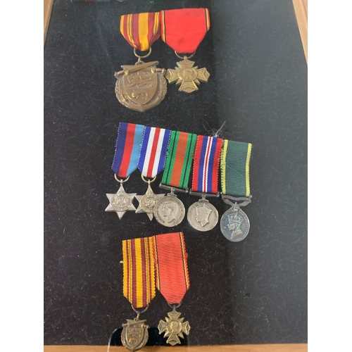 166 - A framed selection of WW2 medals including The Territorial Medal, note on back of frame reads 'T7938... 