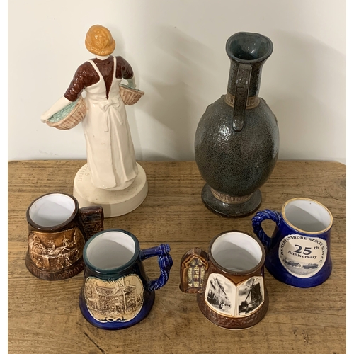 193 - Four Great Yarmouth pottery mugs, a ceramic figurine 'Jennie Herring CWS Canning Lowestoft' limited ... 