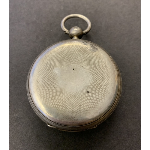 244 - A silver pocket watch (missing hands)