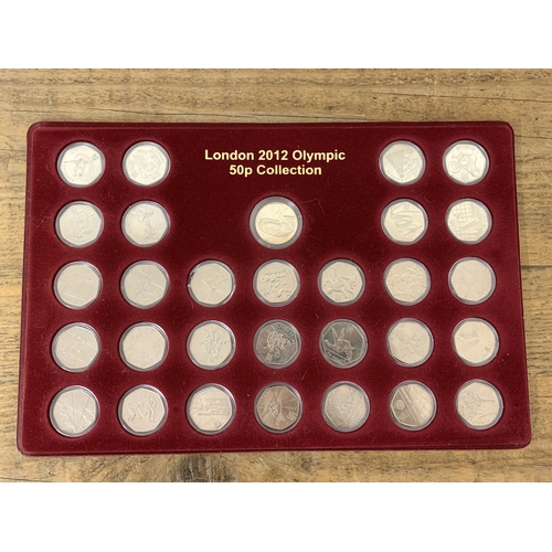 263 - 2012 Olympic 50p coin set complete with medallion