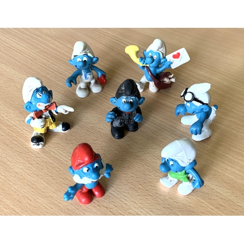 275 - Seven vintage Smurf figurines, some Peyo W Germany