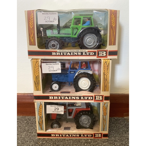 29 - Three boxed vintage Britains Ltd tractors, 1976 Massey Ferguson, 1976 Ford, 1979 Deuz (some mild wea... 