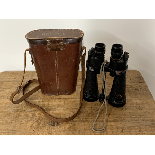 299 - Cased Barr & Stroud military marked binoculars (glue repair to left eye piece)