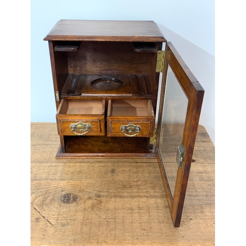 307 - A vintage smokers cabinet with drawers, width 11