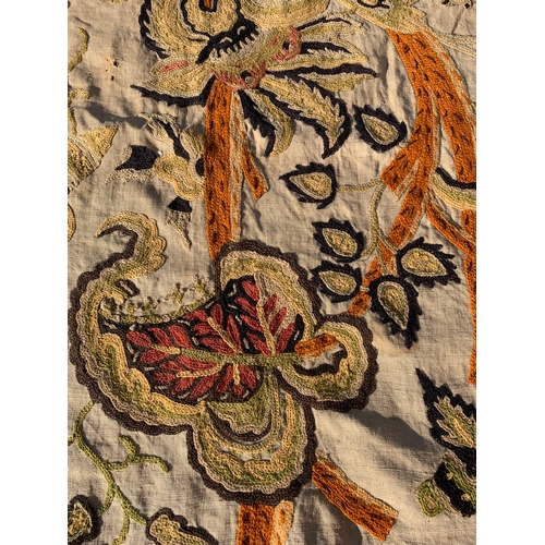 70 - A vintage hand sewn on linen table cloth or single bed cover with floral decoration, approx. 105