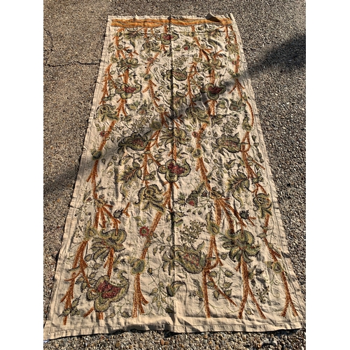 70 - A vintage hand sewn on linen table cloth or single bed cover with floral decoration, approx. 105