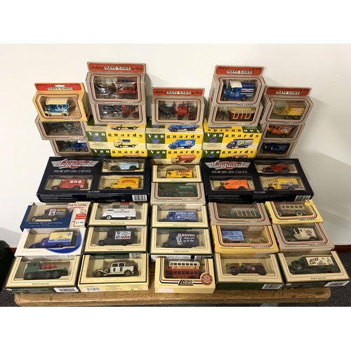 9 - A collection of boxed Days Gone and Lledo Van Guards vehicles