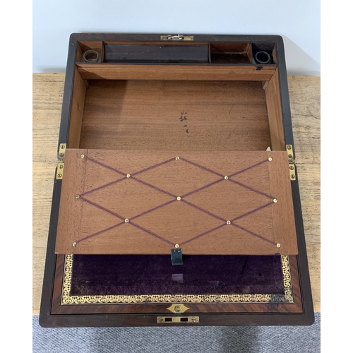 92 - A Victorian rosewood with mother of pearl inlay writing slope, brass inlaid plaque, purple velvet in... 