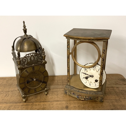 95 - A Victorian solid brass lantern clock, a brass inlaid frame mantel clock with porcelain hand painted... 