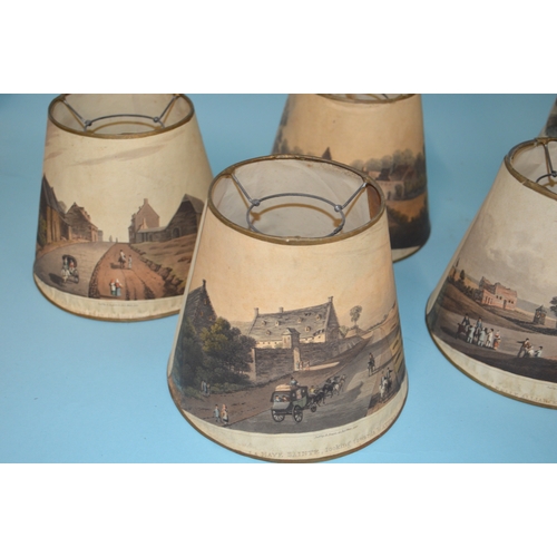 317 - A set of seven late 19th Century printed scene lamp shades, the various prints of London landmark sc... 