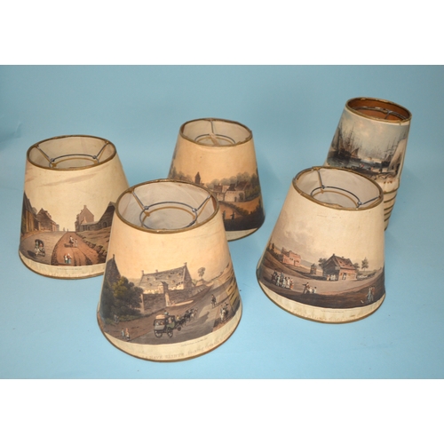 317 - A set of seven late 19th Century printed scene lamp shades, the various prints of London landmark sc... 