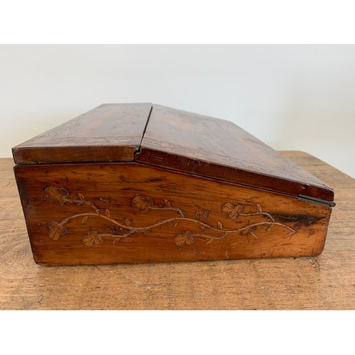 90 - A Victorian inlaid wood fall front writing slope with lift lid, inlaid with a building and floral de... 