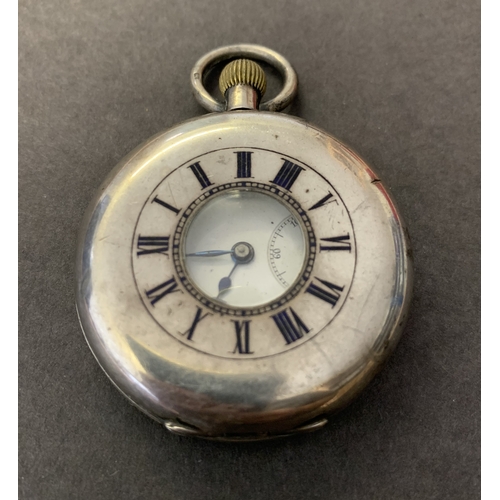 345 - A vintage silver half hunter pocket watch (as found, no glass and no second hand)