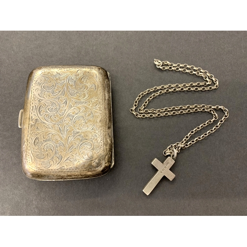 103 - A hallmarked silver cigarette case plus a hallmarked silver cross on white metal chain, combined wei... 