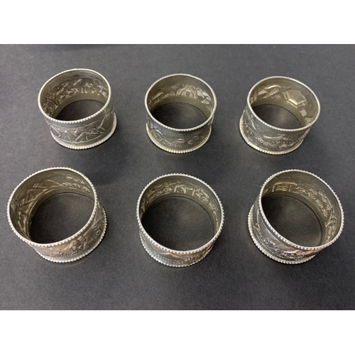 113 - A set of six sterling silver napkin rings, each with an elephant, weight approx. 60g