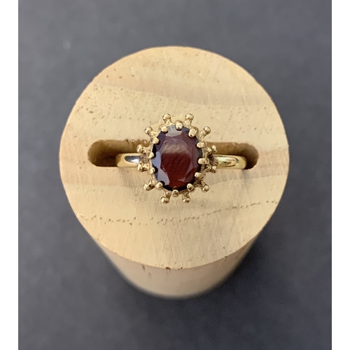 116 - A 9ct gold and red stone ring, approx. size K, total weight approx. 1.5g