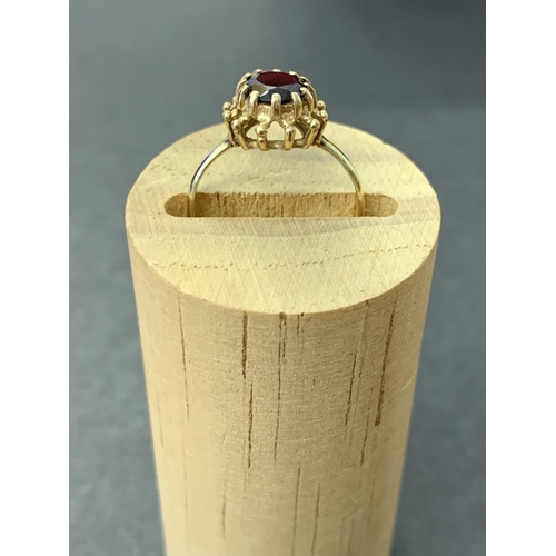 116 - A 9ct gold and red stone ring, approx. size K, total weight approx. 1.5g