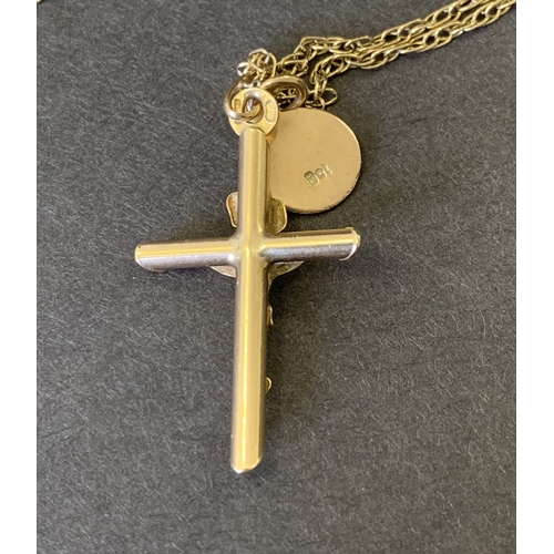 125 - A 9ct gold cross on chain, weight approx. 4g, chain 24