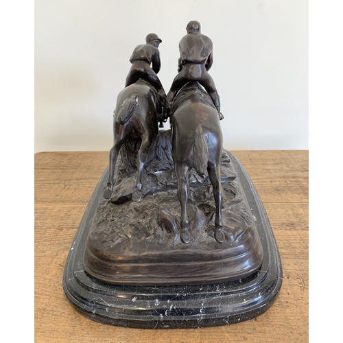 196 - After Paul Louis Emile Loiseau-Rousseau, French (1861-1927), a bronze figure group of a pair of race... 