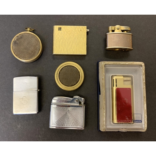 198 - Various vintage gas lighters plus a brass compass/sun dial