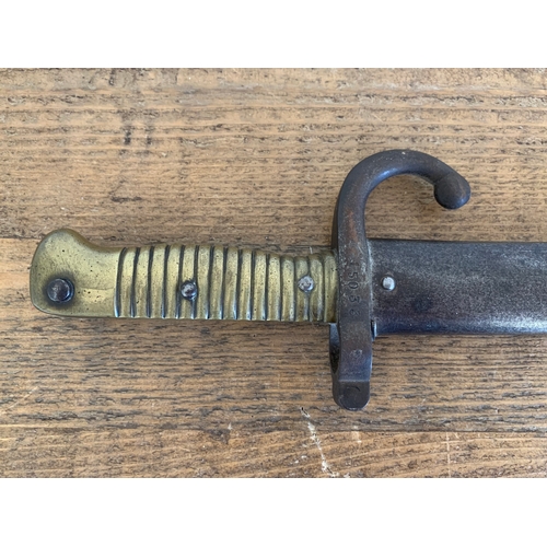 201 - A Egyptian Remington rolling block rifle bayonet