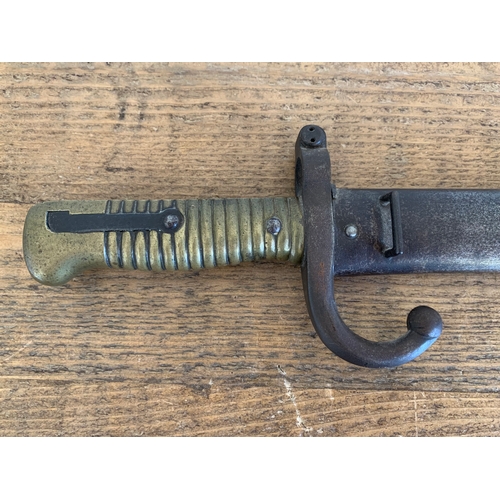 201 - A Egyptian Remington rolling block rifle bayonet