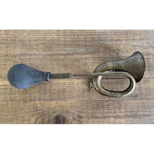 204 - A vintage brass car horn