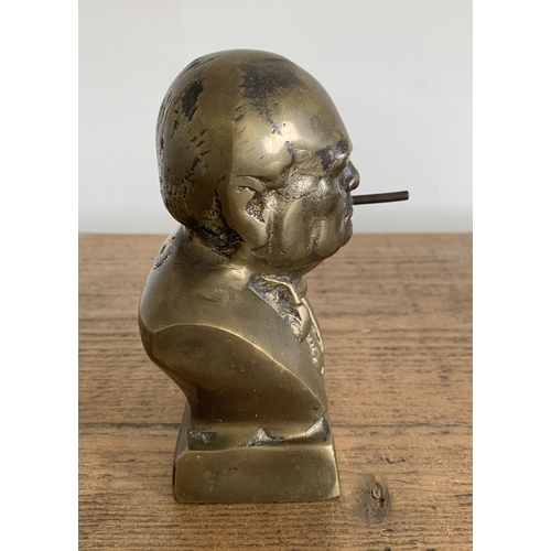 207 - A small but heavy brass bust of Winston Churchill, height approx. 5