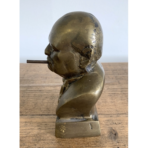 207 - A small but heavy brass bust of Winston Churchill, height approx. 5