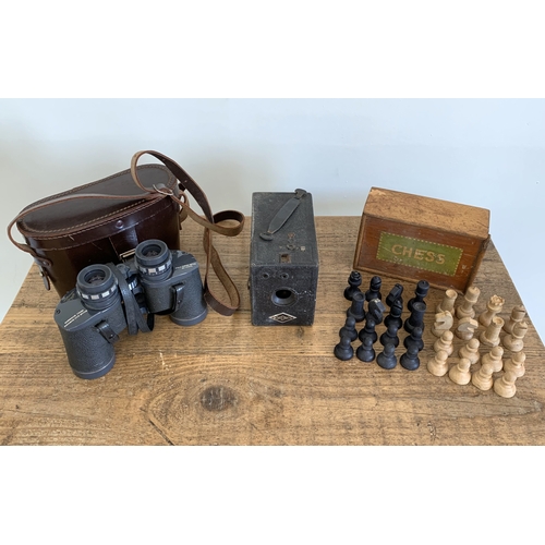 21 - A vintage Coronet camera, a pair of Hilkinson 7 x 35 binoculars (clear optics) plus a boxed wood che... 