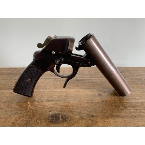 212 - A deactivated German Luftwaffe double barrelled flare pistol, dated 1942 and made by Krieghoff, all ... 