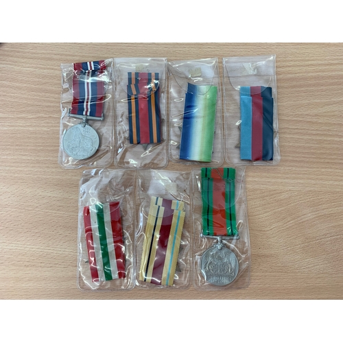 214 - Seven WW2 medals including Burma, Atlantic, Africa, Italy Stars, 1939-45 Star, Defence medal and a 3... 