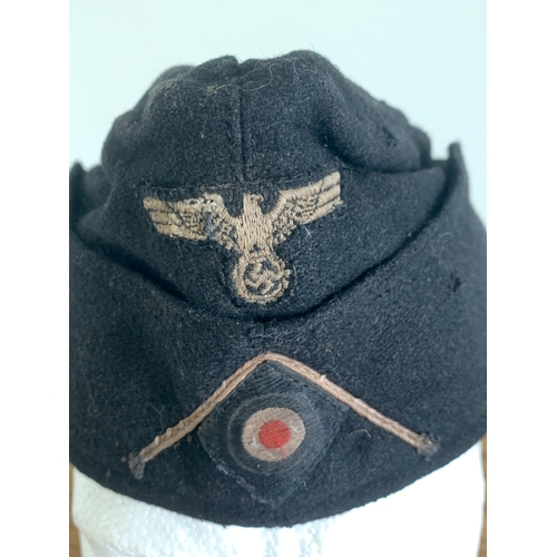 215 - A WW2 German Panzer side cap, dated 1940