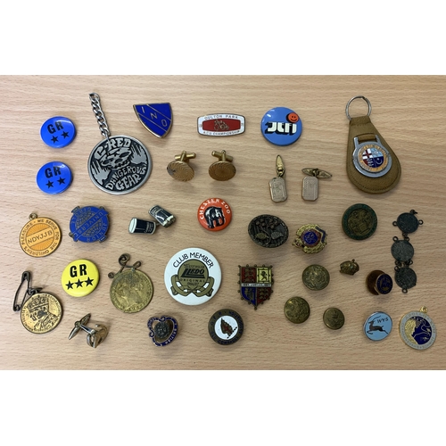 22 - A small selection of vintage badges, cufflinks etc