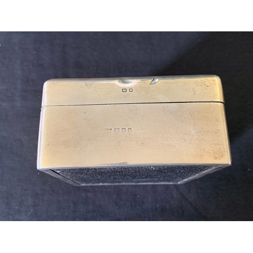 243 - A hallmarked silver cigarette box, marks rubbed, with wood lined interior, 4 1/2