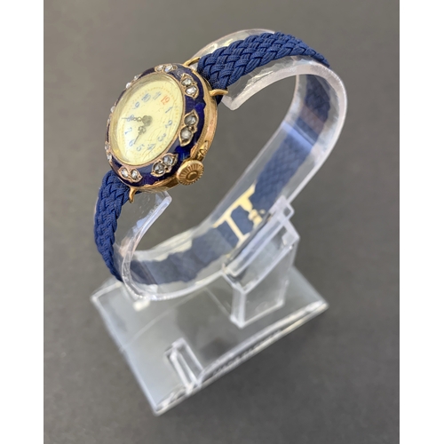 250 - A late 19th/early 20th Century 18ct gold and diamond set ladies wristwatch with blue enamel decorati... 