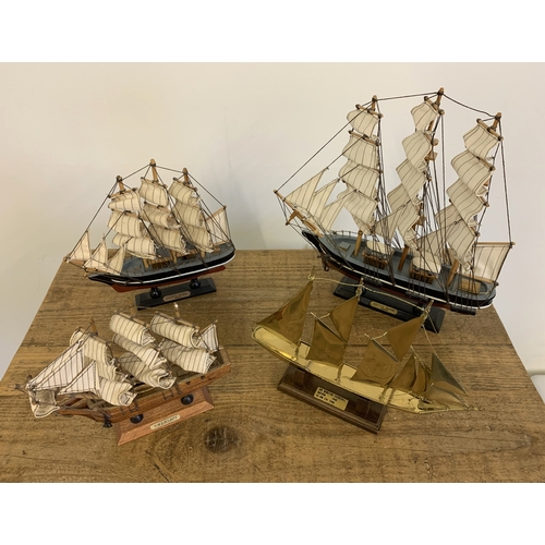 290 - Four various ship models including a wooden Cutty Sark (x2), HMS Bounty plus a brass 'Sir Winston Ch... 