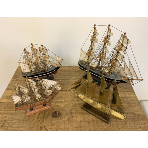 290 - Four various ship models including a wooden Cutty Sark (x2), HMS Bounty plus a brass 'Sir Winston Ch... 