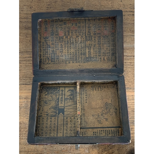 295 - Two Chinese decorative red boxes with brass fittings plus a set of opium scales with Hintha bird wei... 