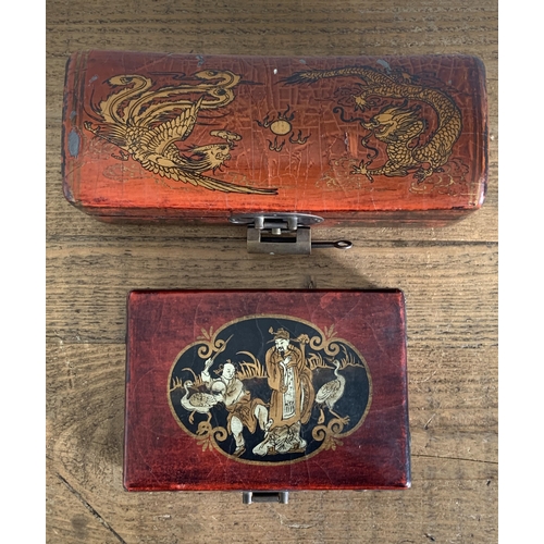 295 - Two Chinese decorative red boxes with brass fittings plus a set of opium scales with Hintha bird wei... 