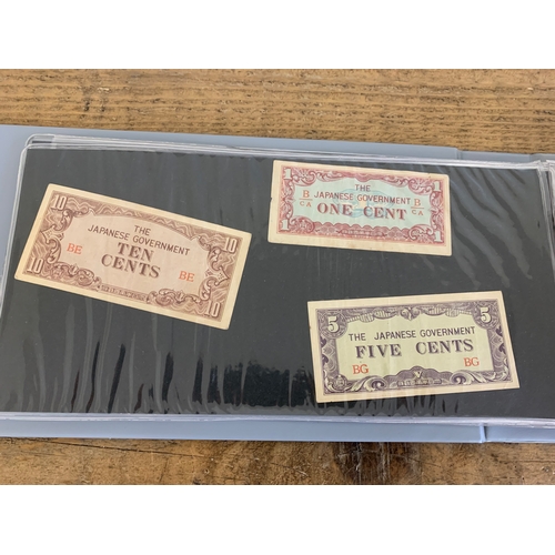 301 - An album of mixed bank notes, Japanese and Chinese WW2 with others